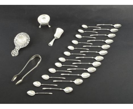 Dutch silver to include two sets of twelve tea/demi tasse spoons, caddy spoon, decorative pierced engraved strainer, circular