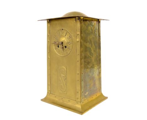 Arts & Crafts planished brass cased mantel clock, of rectangular tapered form with embossed decoration and riveted mounts, th