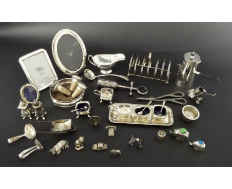 Mixed selection of assorted silver plated ware including condiment sets, photograph frames, miniature trinkets, decanter stop