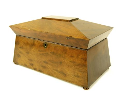 Victorian mahogany tea caddy of sarcophagus form, the hinged top enclosing a later glass mixing bowl and two lidded container