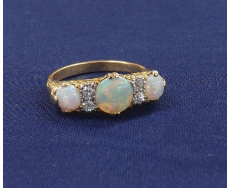 Attractive 18ct opal and diamond claw set dress ring, ring size O