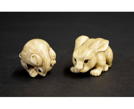 Japanese ivory okimono of a crouching rabbit, signed, 2" long; also a netsuke of a mouse crouched in a ball, signed, 1.5" (2)