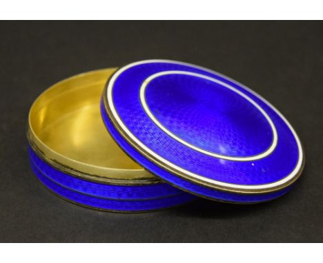 Continental blue and white guilloche enamel silver-gilt circular box and cover, import hallmarks for London 1912, stamped 'TH