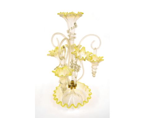 Victorian vaseline glass epergne, with pinch trail decoration stained yellow to the rims. 21" high