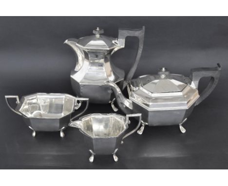 (587250029) Silver four piece tea service of octagonal form upon paw design feet, maker Emile Viner, Sheffield 1962, the wate