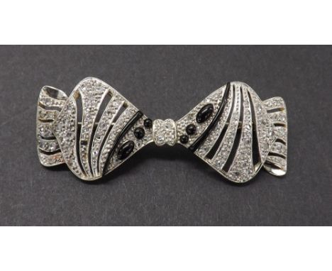 French diamond and dark enamel set brooch, 7.8gm, 46mm wide