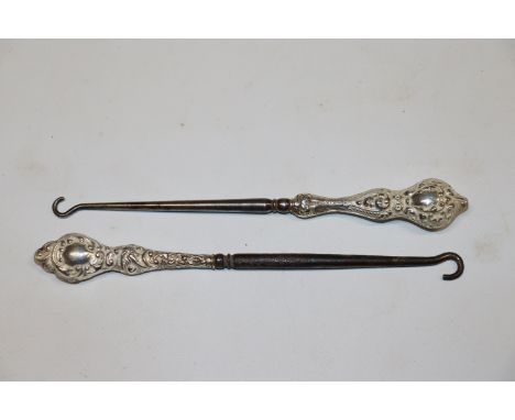 A James Deakin Chester 1903 silver handled button hook; and a W.J. Myatt & Co. 1910 silver handled button hook