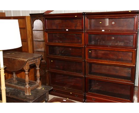 A Globe Wernicke five tier mahogany bookcase, fitted single drawer to the base 