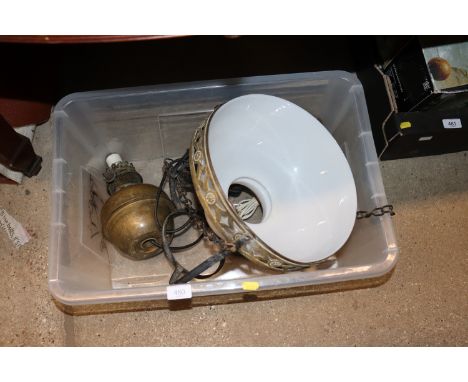 Two brass oil lamps, converted; and a pedant ceiling light with opaque glass shade 