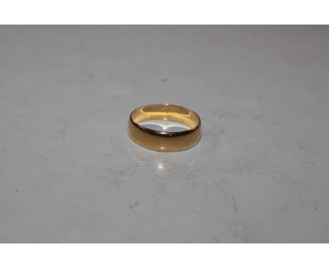 A 22ct gold wedding band, approx. 2.8gms, rings size K/L