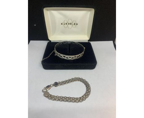 TWO MARKED 925 BRACELETS ONE A BANGLE IN A PRESENTATION BOX THE OTHER A TWO STRAND LINK 
