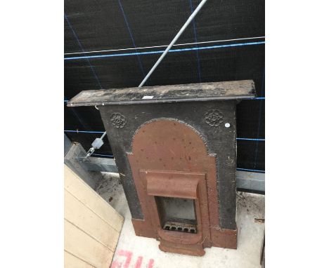 A CAST IRON BEDROOM FIRE SURROUND 