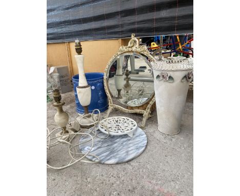 AN ASSORTMENT OF ITEMS TO INCLUDE LAMPS, A SWING FRAME MIRROR AND A PLANTER ETC 