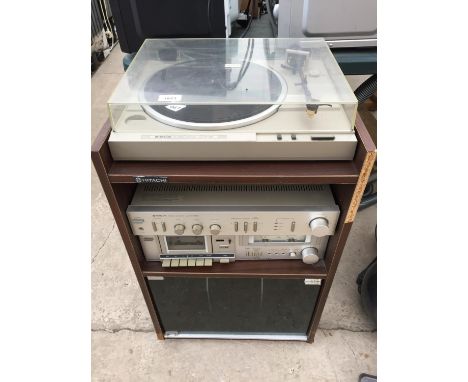 AN HITACHI STEREO SYSTEM WITH RECORD PLAYER AND WOODEN STEREO CABINET 