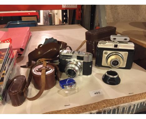 AVINTAGE LEATHER CASED ILFORD 'SUPER SPORTS' CAMERA, A VINTAGE LEATHER CASED VOIGHANDER CAMERA, ETC 