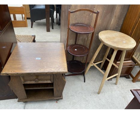 AN OAK LAMP TABLE/MAGAZINE RACK, AFTERNOON TEA STAND AND BEECH STOOL 