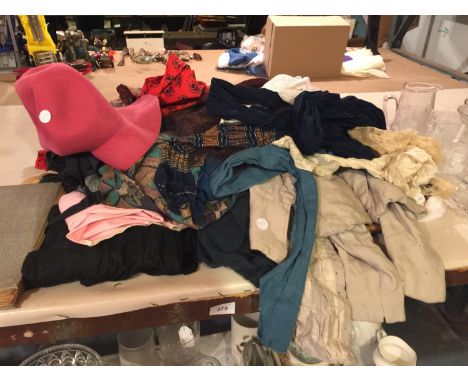 A QUANTITY OF VINTAGE CLOTHES TO INCLUDE ADULTS AND CHILDRENS 
