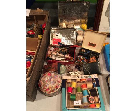 A COLLECTION OF SEWING RELATED ITEMS TO INCLUDE, COTTON, VARIOUS TYPES OF NEEDLES, BUTTONS, VINTAGE TINS, ETC 