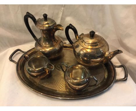 A METAL TEA SET COMPRISING OF A TEAPOT, COFFEE POT, CREAM JUG, SUGAR BOWL AND TRAY 