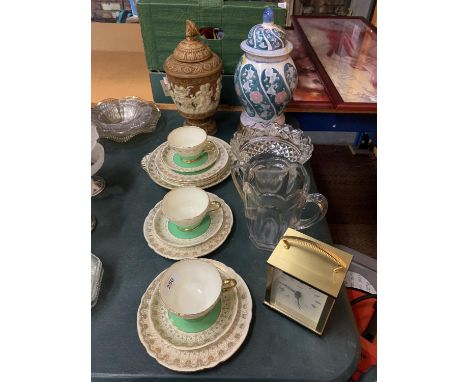 THREE SHELLEY TRIOS IN A GREEN AND GOLD COLOURED DESIGN, A SANDWICH PLATE AND FIVE OTHER ITEMS TO INCLUDE A CARRIAGE CLOCK, A