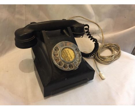 A VINTAGE BLACK BAKELITE TELEPHONE.  RECEIVER A/F 