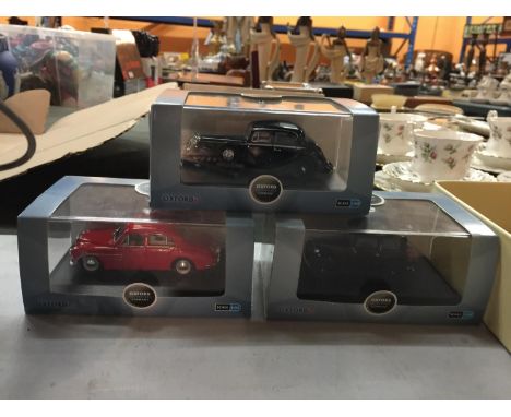 THREE BOXED OXFORD DIE CAST MODELS TO INCLUDE A SCALE 1:43 BLACK JAGUAR, AN AUSTIN RUBY SALOON AND A RED MGZA MAGNETTE 