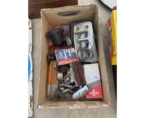 AN ASSORTMENT OF VINTAGE AUTOMOBILE SPARES TO INCLUDE LIGHTS ETC 