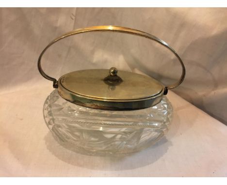 A LIDDED CUT GLASS BOWL/ BISCUIT BARREL, MARKED OX WMF EP NS I/O.  HEIGHT 13CM, WIDTH 24CM 