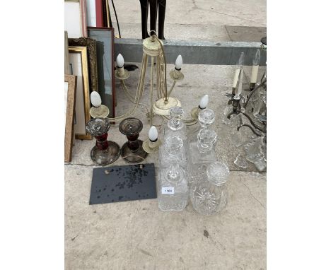 AN ASSORTMENT OF ITEMS TO INCLUDE SIX GLASS DECANTORS, A LIGHT FITTING AND CANDLESTICKS ETC 