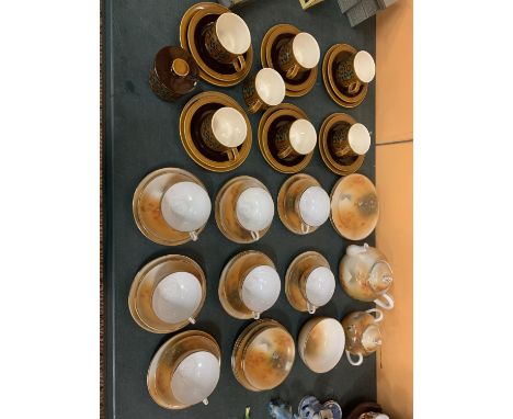 A BLUSH ORIENTAL TEASET WITH SEVEN TRIOS, THE TEACUPS OF WHICH HAVE AN EMBOSSED BASED INSIDE SHOWING A FEMALE WHEN HELD UP TO