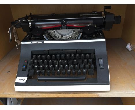 A RETRO ADLER TYPEWRITER 