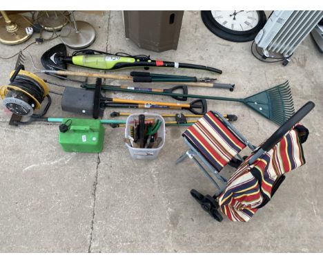 A QUANTITY OF GARDEN TOOLS, PETROL CONTAINER, EXTENSION REEL ETC 