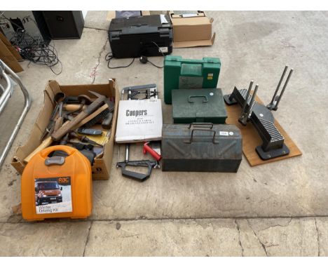 AN ASSORTMENT OF TOOLS TO INCLUDE TOOL BOXES, WIRE BRUSHES AND AN AXE ETC 