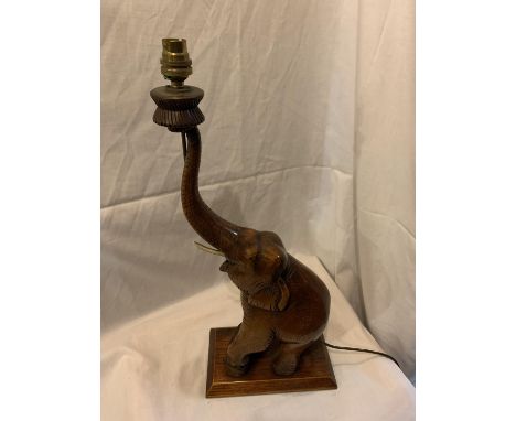 A WOODEN ELEPHANT DESIGN TABLE LAMP 