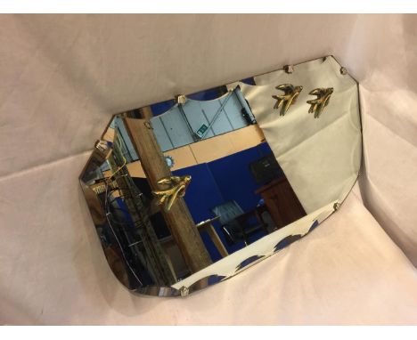 A VINTAGE MIRROR WITH A FLUTED EDGE DECORATED WITH BIRDS 