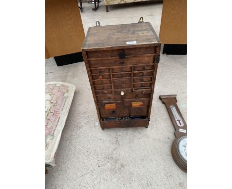 A VINTAGE VICTORIAN PINE WATCHMAKERS HABERDASHERY CABINET, ENCLOSING 24 VARIOUS SIZED DRAWERS AND TO INCLUDE A CONTENTS OF TO