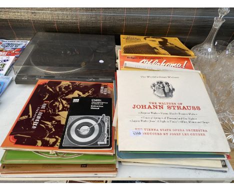 A TECHNICS SL-B200 RECORD PLAYER AND AN ASSORTMENT OF LP RECORDS 