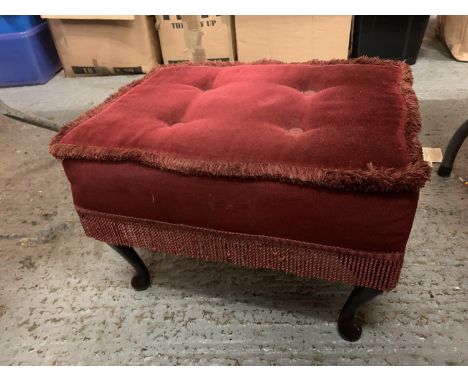 A VINTAGE FOOTSTOOL WITH RED VELVET UPHOLSTERY 