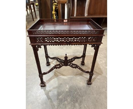 A silver table in Chinese Chippendale style. 24' wide. Of recent manufacture