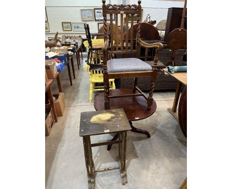 An oak carved elbow chair, a nest of two tables and an oak low table on tripod support (3)