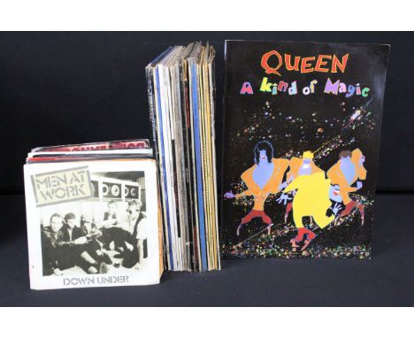 Viny &amp; memorabilia - 21 Rock &amp; Pop LPs, 35 7" singles, and 7 tour programmes. LPs include The Rolling Stones Sticky F