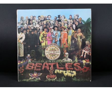 Vinyl - The Beatles Sgt Pepper LP on Parlophone Records - PMC 7027, Fourth Proof sleeve, AR D 13217 printed on the flip back,