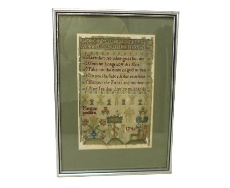 A George II needlework sampler, pictorial and prose by Margrat Pitcairn. Housed in a modern frame, size 25 by 1 by 34cm. 
