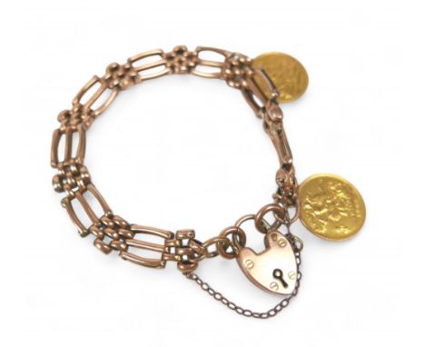 A 9ct gold gate link bracelet with two Edward VII half sovereigns, dated 1906 and 1908, total weight 23.5g. 