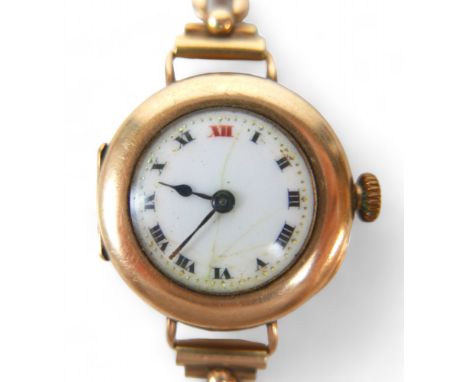 A 9ct yellow gold manual wind bracelet wristwatch, 26mm case, total weight 23.6gs, strap broken, running. 