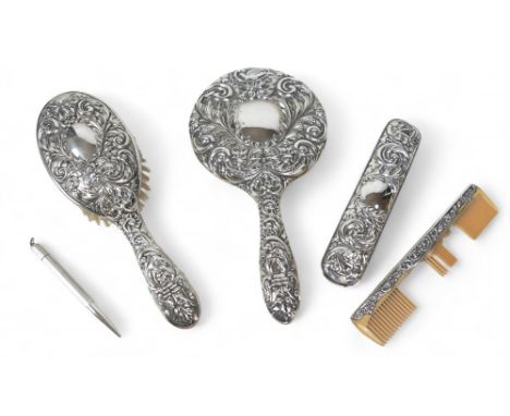 A silver dressing table set, comprising a hairbrush, handheld mirror, comb, a/f, and a brush, W I Broadway & Co, Birmingham 1