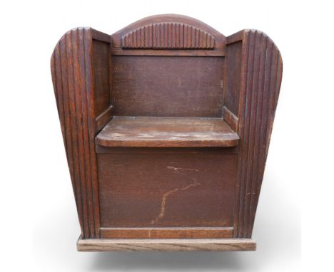 An Art Deco hall seat with umbrella stands, with hinged lift seat, ???? 