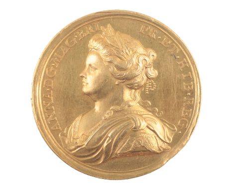 A QUEEN ANNE GOLD MEDAL BY JOHN CROKER (1670-1741)minted to celebrate the Peace of Utrecht 1713, the obverse with a draped an