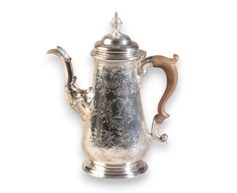A GEORGE II SILVER COFFEE POTby Fuller White, London 1758, with chased floral decoration and cartouches with stags head crest