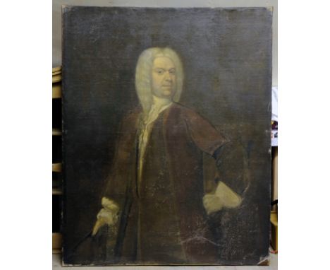 ENGLISH SCHOOL, 18th century A portrait of a gentleman wearing a red coat and a powdered wig, standing three-quarter length, 